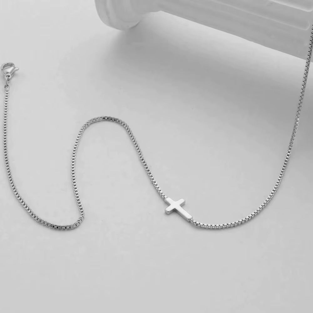 Dainty silver cross
